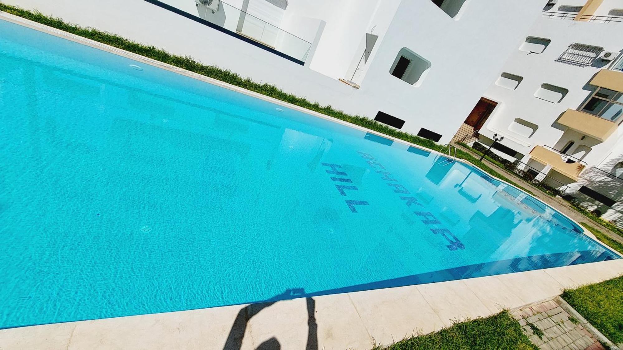 Appartement Avec Piscines, Vue Sur Mer Et Acces A La Plage A Achakar Hill, Tanger. Exterior photo